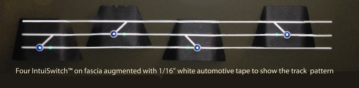 Four fascia-mounted IntuiSwitch™ controls augmented with automotive striping tape to show trackage between them.